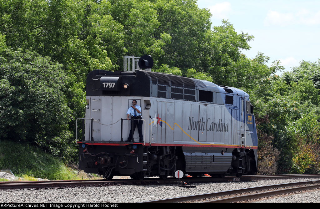 RNCX 1797 backs down to couple to train 92